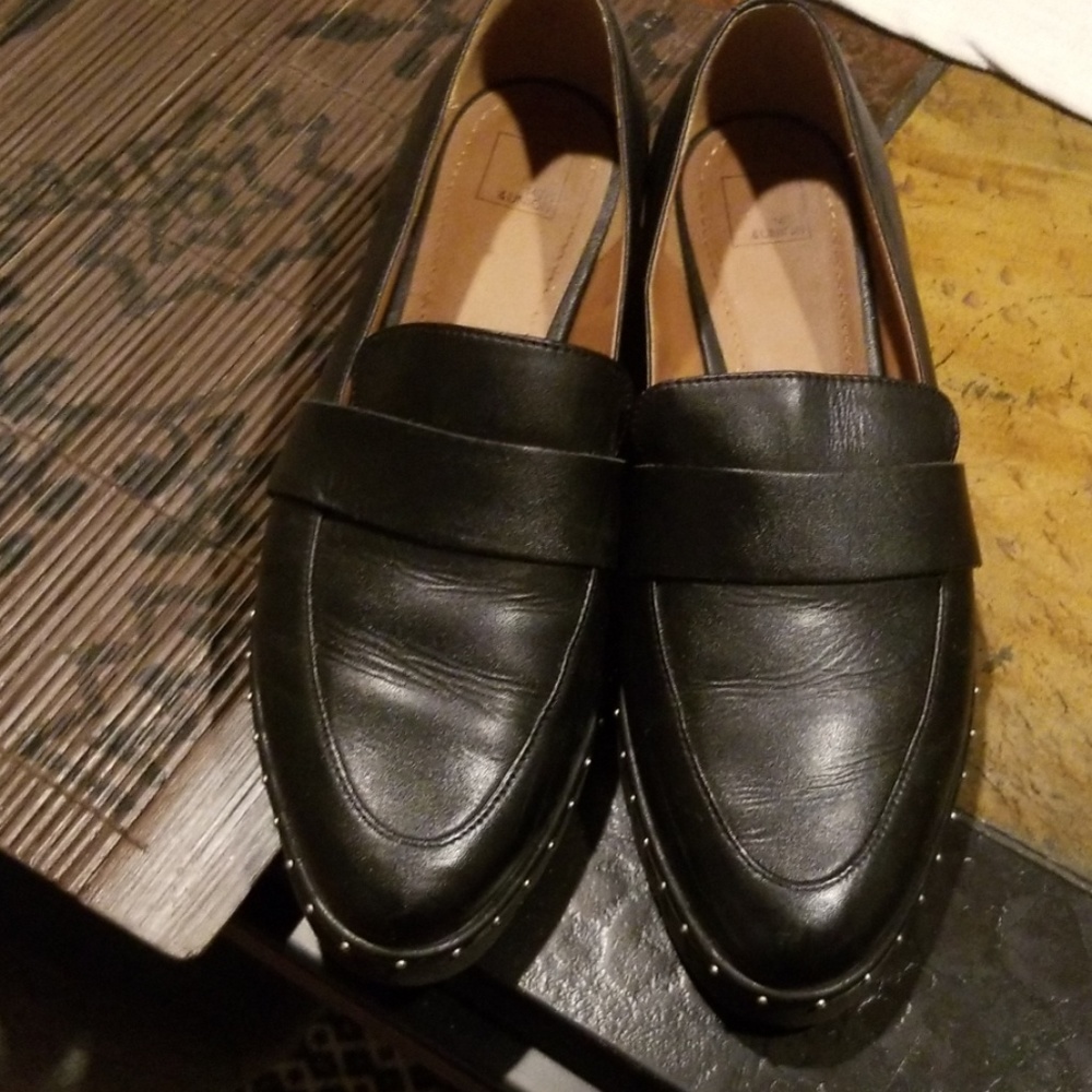 Black loafers with small silver beads
